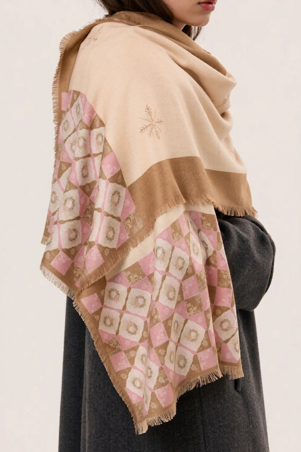 Silk long wrap worn over a wool coat in winter