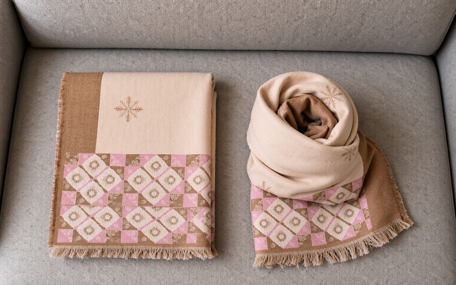 Long silk-wool wrap folded flat as a travel blanket and a lumbar cushion